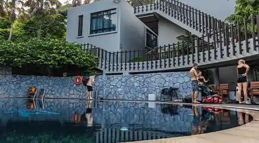 Scuba Training Pool at Flow Divers Koh Tao Divers preparing for scuba training beside a pool in Koh Tao