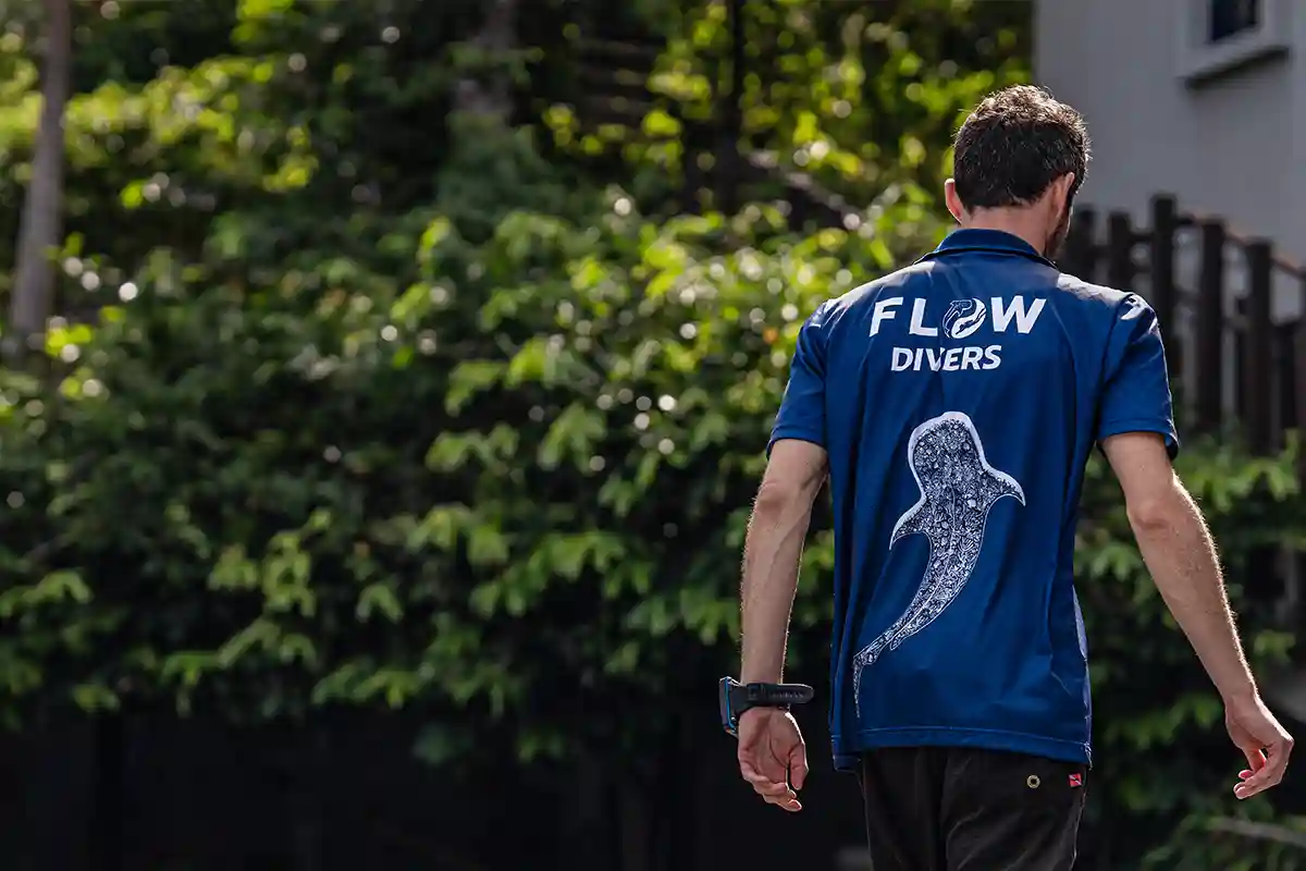 Flow Divers Dive Crew Koh Tao Flow Divers dive crew member walking at the dive centre in Koh Tao