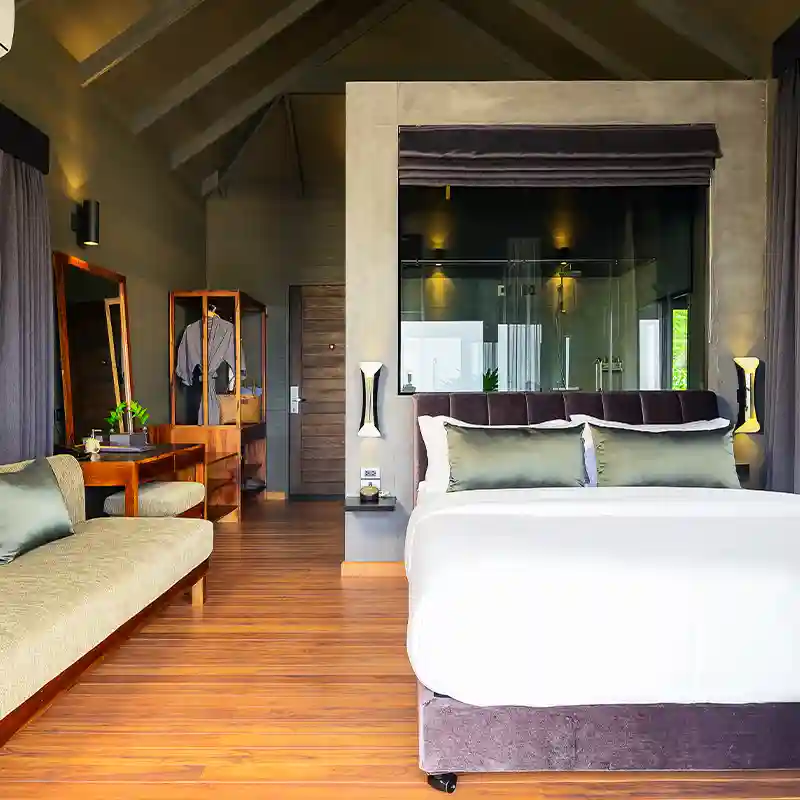 Private Villa Bedroom for Diving Accommodation in Koh Tao Private villa bedroom with lounge area for diving accommodation in Koh Tao