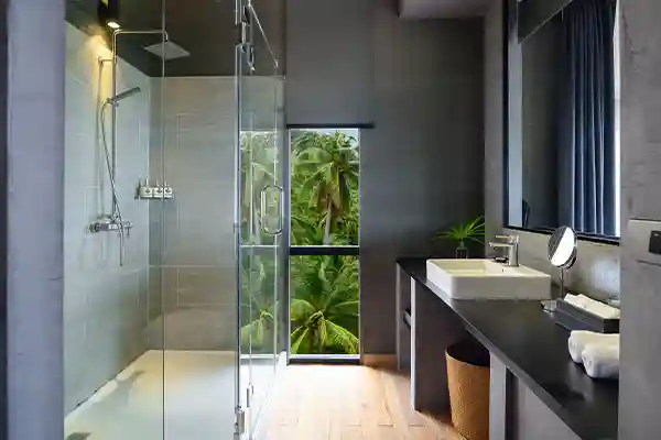 Villa Bathroom for Diving Accommodation in Koh Tao Modern villa bathroom with tropical palm view for diving accommodation in Koh Tao