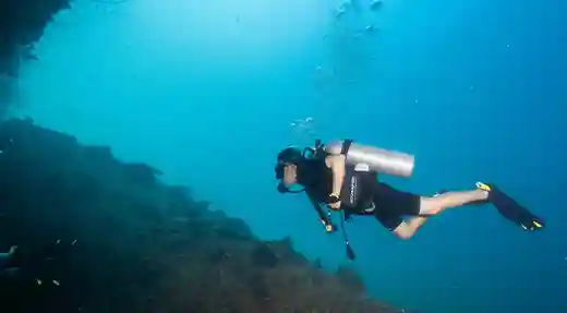 PADI Deep Diver Course in Koh Tao Diver exploring a deep reef during the PADI Deep Diver course in Koh Tao