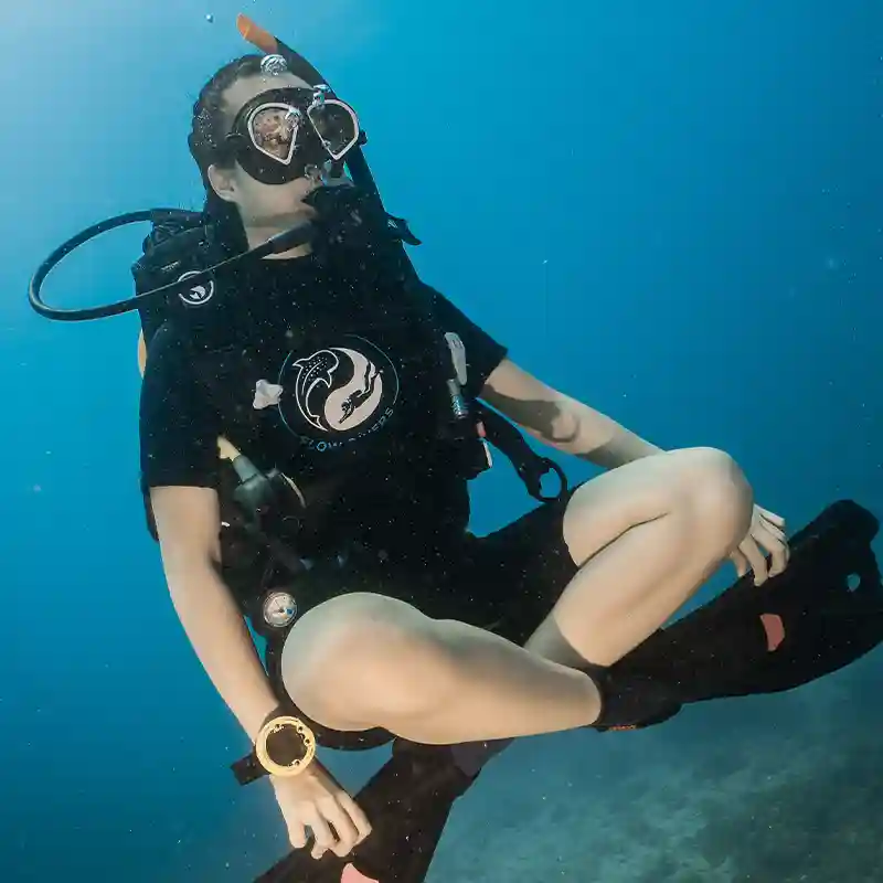 Diver practising buoyancy control during a PADI Scuba Diver Course in Koh Tao