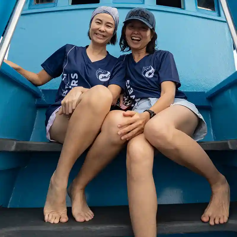 PADI Scuba Diver Course Boat Trip in Koh Tao Two divers smiling on the dive boat during a PADI Scuba Diver Course in Koh Tao