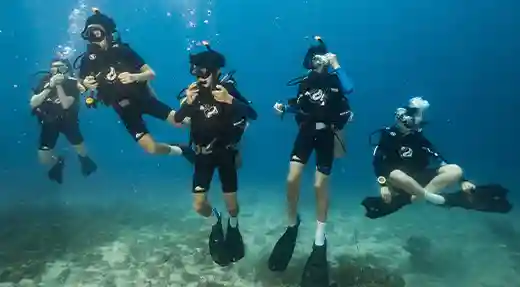 PADI Scuba Diver Underwater Skills Practice in Koh Tao Students practising underwater skills during a PADI Scuba Diver Course in Koh Tao